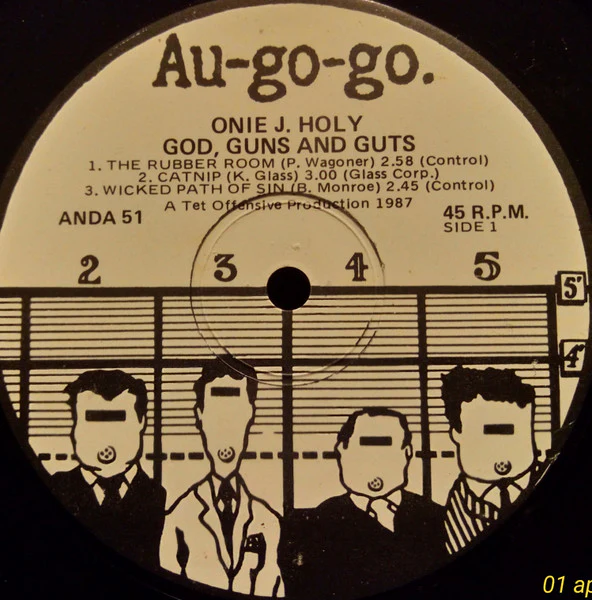 Onie J. Holy – God, Guns & Guts (E/VG+) – 12", AU 1986 - Image 2