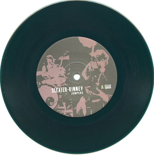 Sleater-Kinney – Jumpers (E/VG+) – 7", US 2005 - Image 3