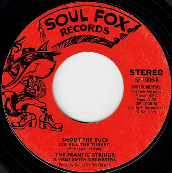 The Frantic Strings, Fred Smith Orchestra, Jackie Lee – Shoot The Duck (Or Kill The Turkey) / The Shootgun & The Duck (E/Generic) – 7", US 1975