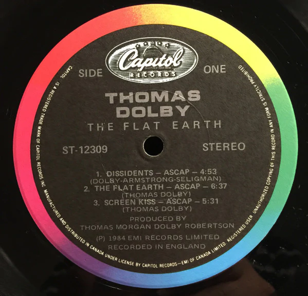 Thomas Dolby – The Flat Earth (E/VG+) – LP, CA 1984 - Image 10